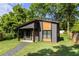 Contemporary outbuilding with gray siding, modern windows, and well manicured grass at 2608 Argo Drive Southeast Se Dr, Smyrna, GA 30080