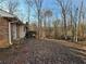 Spacious backyard with a wooden deck, perfect for outdoor activities at 3415 Spring Valley Blvd, Atlanta, GA 30349