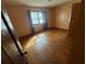 Bedroom with wood floors and a window at 3415 Spring Valley Blvd, Atlanta, GA 30349