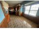 Eat-in kitchen featuring linoleum flooring and natural light at 3415 Spring Valley Blvd, Atlanta, GA 30349