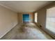 Living room with large windows allowing natural light to illuminate the space at 3415 Spring Valley Blvd, Atlanta, GA 30349