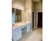 Bathroom with double vanity and ample lighting at 518 Oriole Farm Trl, Canton, GA 30114