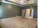 Main bedroom with large windows and ensuite bathroom at 518 Oriole Farm Trl, Canton, GA 30114