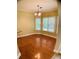 Bright breakfast nook with wood floors and views of the backyard at 518 Oriole Farm Trl, Canton, GA 30114