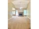 Large living room with a vaulted ceiling and a stone fireplace at 518 Oriole Farm Trl, Canton, GA 30114