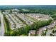 An aerial view of a residential neighborhood at 1494 Weeping Tree Cir, Auburn, GA 30548
