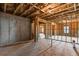 Unfinished basement with exposed ceiling and concrete walls offering customization potential at 1494 Weeping Tree Cir, Auburn, GA 30548