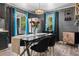 Contemporary dining area with modern lighting and decor, perfect for entertaining guests or Gathering meals at 5143 3Rd St, Morrow, GA 30260