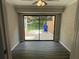 Cozy room with a sliding glass door that opens to a private patio at 7123 Woodridge Ln, Union City, GA 30291