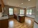 Charming kitchen with an island, stainless steel appliances, and lots of natural light at 7123 Woodridge Ln, Union City, GA 30291