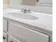 Close up of a white sink in bathroom with white cabinets below at 2035 Stonebrook Dr, Austell, GA 30106