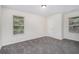Bedroom featuring natural light, neutral carpet, and door at 2035 Stonebrook Dr, Austell, GA 30106