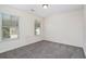Bright, carpeted room with natural light at 2035 Stonebrook Dr, Austell, GA 30106