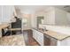 Well-lit kitchen with granite countertops, stainless steel appliances, and white cabinets at 2035 Stonebrook Dr, Austell, GA 30106