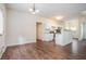 Bright and airy living room area with hardwood floors and a kitchen view at 2035 Stonebrook Dr, Austell, GA 30106