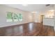 Spacious living room featuring hardwood floors, large windows, and an open concept design at 2035 Stonebrook Dr, Austell, GA 30106
