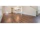 Open-concept space with hardwood floors, natural light, and a view of the modern kitchen at 2035 Stonebrook Dr, Austell, GA 30106