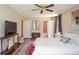 Spacious bedroom with hardwood floors and ensuite bathroom at 2997 Happy Hollow Se Dr, Conyers, GA 30094