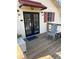 Outdoor deck area with chairs and access to the interior of the home at 2997 Happy Hollow Se Dr, Conyers, GA 30094