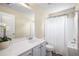 Bathroom featuring a single sink vanity, white cabinets and a shower/tub combination at 3610 Chestnut Meadows Dr, Douglasville, GA 30135