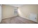 Carpeted bedroom with a window with blinds and a neutral color palette at 3610 Chestnut Meadows Dr, Douglasville, GA 30135