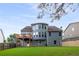 Exterior of the house showing the backyard, deck and the architectural design at 3610 Chestnut Meadows Dr, Douglasville, GA 30135