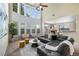 Bright living room with large windows, plush seating, and an open floor plan at 3610 Chestnut Meadows Dr, Douglasville, GA 30135