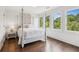This bedroom is flooded with natural light from the ample windows at 4935 Stablegate Ct, Cumming, GA 30028
