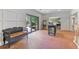 Spacious foyer with beautiful brick flooring and access to the outdoor patio at 4935 Stablegate Ct, Cumming, GA 30028