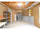 Unfinished basement with metal storage shelves and modern flooring at 920 Waters Reach Ct, Alpharetta, GA 30022