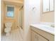 Bathroom featuring tile flooring, single vanity and shower with glass doors at 920 Waters Reach Ct, Alpharetta, GA 30022