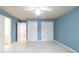 Spacious bedroom with white doors and a ceiling fan, carpet flooring and neutral trim for a comfortable retreat at 920 Waters Reach Ct, Alpharetta, GA 30022