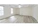 Spacious bedroom with modern ceiling fan, hardwood floors, and ample natural light at 920 Waters Reach Ct, Alpharetta, GA 30022