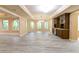 Spacious living room with new flooring, custom cabinets and lots of natural light at 920 Waters Reach Ct, Alpharetta, GA 30022