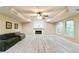 Living room with modern flooring, cozy fireplace and comfortable seating area at 920 Waters Reach Ct, Alpharetta, GA 30022