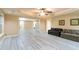 Spacious living room showcasing stylish flooring and abundant natural light at 920 Waters Reach Ct, Alpharetta, GA 30022