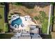 Gorgeous aerial view of the kidney shaped pool and spa in the backyard at 108 Fountain Oak, Villa Rica, GA 30180