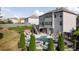 Picture of the backyard that features a pool, spa, deck, and an outdoor fireplace at 108 Fountain Oak, Villa Rica, GA 30180