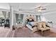 This primary bedroom features a ceiling fan, tray ceilings, and ample natural light at 108 Fountain Oak, Villa Rica, GA 30180