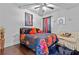 Cozy bedroom with hardwood floors, stylish decor, and comfortable furniture at 108 Fountain Oak, Villa Rica, GA 30180