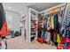 Large walk-in closet with custom shelving and ample storage for clothes, shoes, and accessories at 108 Fountain Oak, Villa Rica, GA 30180