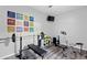 Home gym is equipped with weightlifting equipment, perfect for exercise at 108 Fountain Oak, Villa Rica, GA 30180