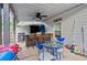 Outdoor patio featuring a built-in bar, covered seating, and a barbecue grill, perfect for entertaining at 108 Fountain Oak, Villa Rica, GA 30180