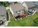 Aerial view of the home's back exterior, showing a deck, patio, and fenced yard at 1840 Tululah Trl, Smyrna, GA 30082