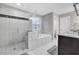 Elegant bathroom with walk-in shower, soaking tub, and sleek vanity at 1840 Tululah Trl, Smyrna, GA 30082