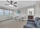 Versatile bonus room featuring natural light, ceiling fan, and workspace with adjoining bath at 1840 Tululah Trl, Smyrna, GA 30082
