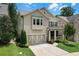 Inviting two-story home with a beautifully landscaped yard and a spacious driveway at 1840 Tululah Trl, Smyrna, GA 30082