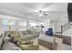 Open-concept living area with a modern kitchen and a comfortable seating arrangement at 1840 Tululah Trl, Smyrna, GA 30082