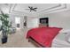 Bright primary bedroom with a view of the ensuite bathroom, large bed, and a leafy plant at 1840 Tululah Trl, Smyrna, GA 30082