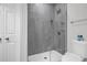 Modern bathroom with glass shower, gray tiling, and updated fixtures at 1840 Tululah Trl, Smyrna, GA 30082